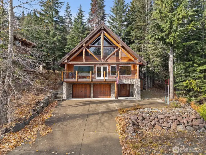 Step into a beautiful custom built European style chalet, with heated driveway