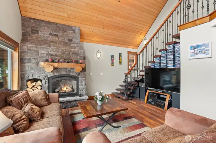 propane gas fireplace, custom iron spindle stair railing