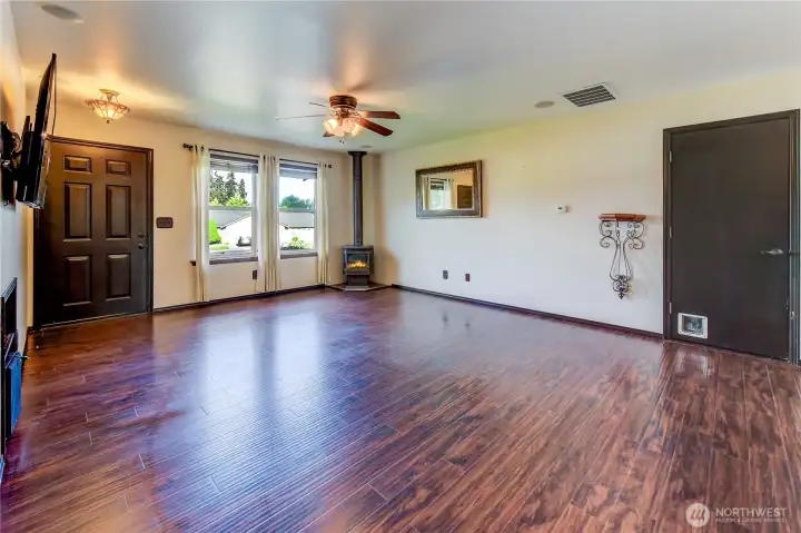 Bright living room with propane stove