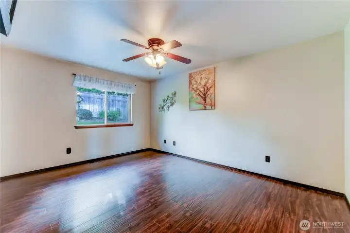 Primary bedroom looks into back yard
