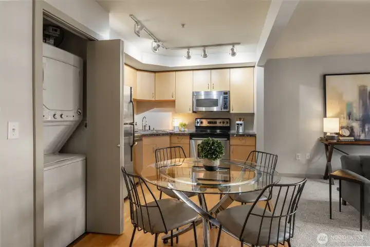 In unit wash/dryer stays with condo. Dryer is electric.