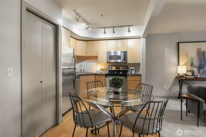 Laundry closet bifold door. Plenty of kitchen cabinetry.