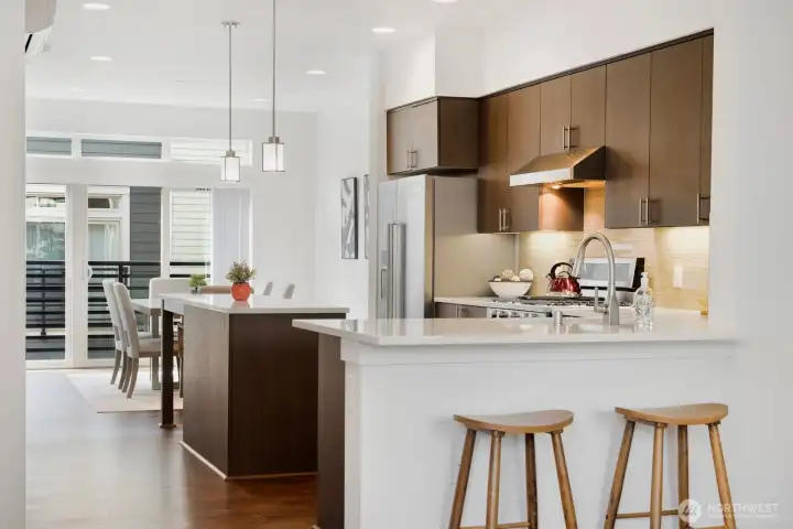 Kitchen counter peninsula for more storage and eating space.
