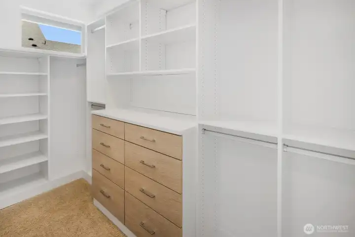 Primary suite has large walk-in closet with premium California Closets storage system. Every closet has been upgraded with California Closets.