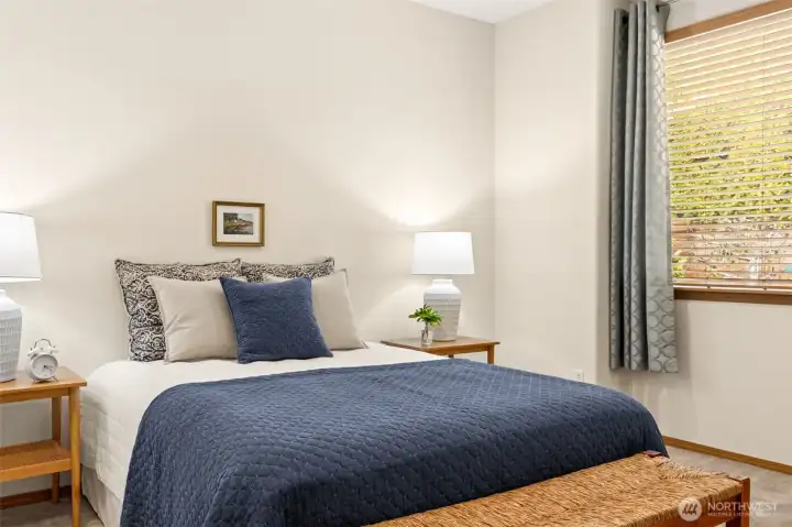 Primary bedroom has upgaded window bump out