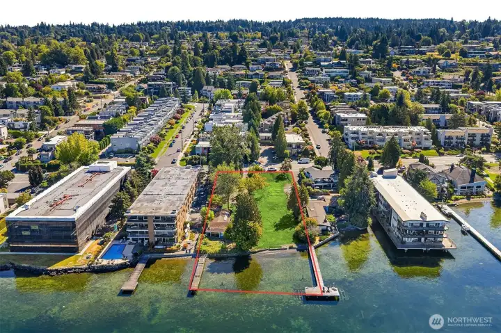 With 125ft of shoreline with a private dock to the north and shared dock to the south, you'll enjoy sweeping, west-facing views of the Seattle skyline and Olympic mountains.