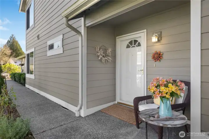 Side front entrance with glass storm door...sit and enjoy!