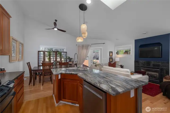 New light fixture and walnut wood ceiling fan...unique granite shipped all the way from Brazil.