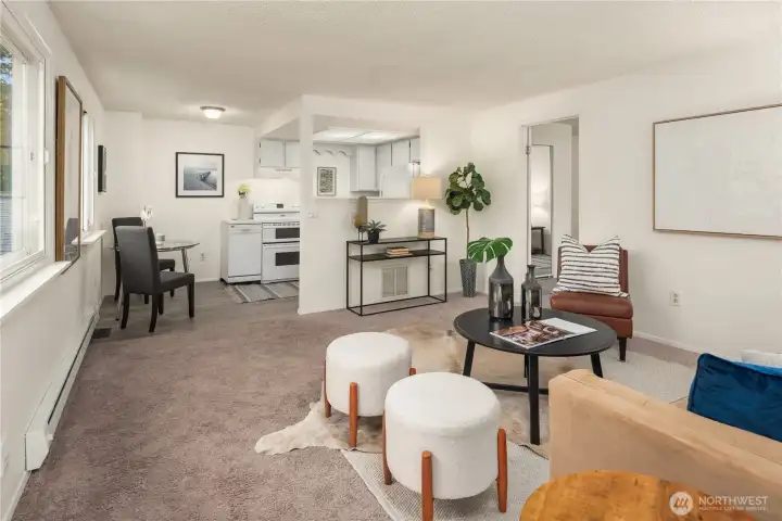 The over-the-garage ADU is spacious and bright with a large living room and separate bedroom.