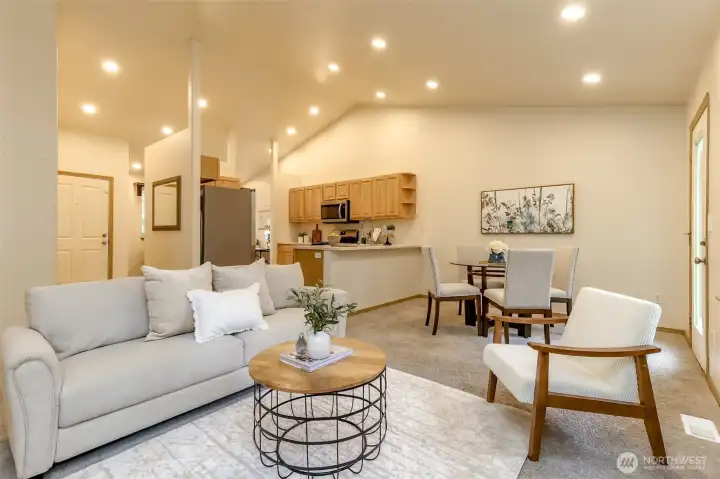 Beautifully appointed single story home with an open floorpan, vaulted ceilings and newly updated LED recessed lighting.