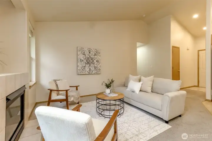 Family room with gas fireplace just off the main entry.