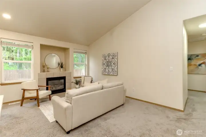 Hallway leads to the 3 bedrooms. Backyard backs up to a treed area and no other home.