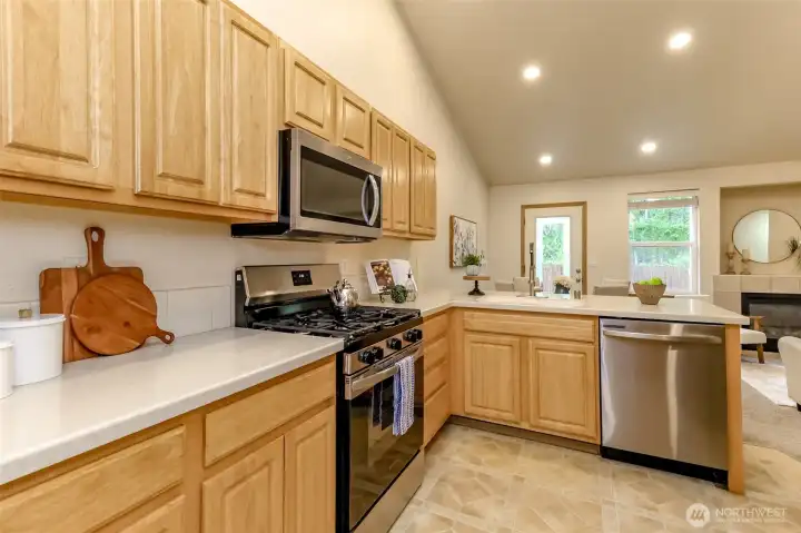 New oven/range, new microwave and updated dishwasher. Beautiful quartz counter tops and new kitchen faucet.