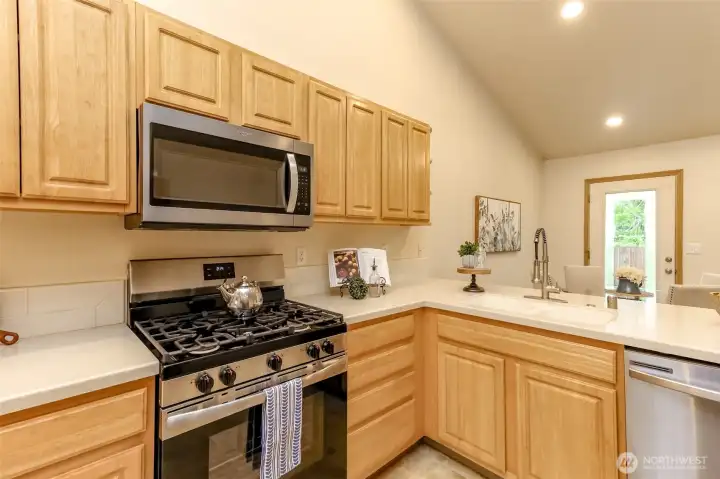 An abundance of cabinets and storage in this kitchen.