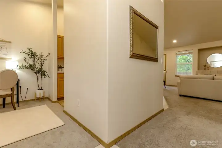 This angle is from the front door and the flex room is to the left and the family room is straight ahead.