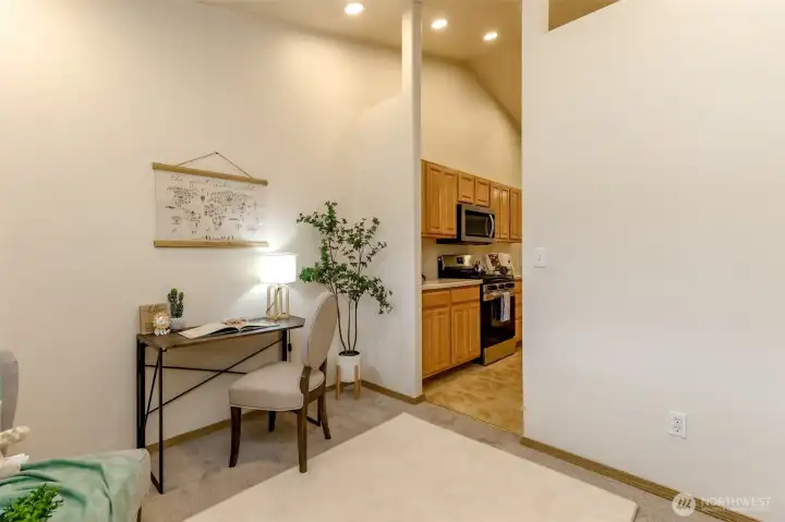 This front room has this entry door to the kitchen.