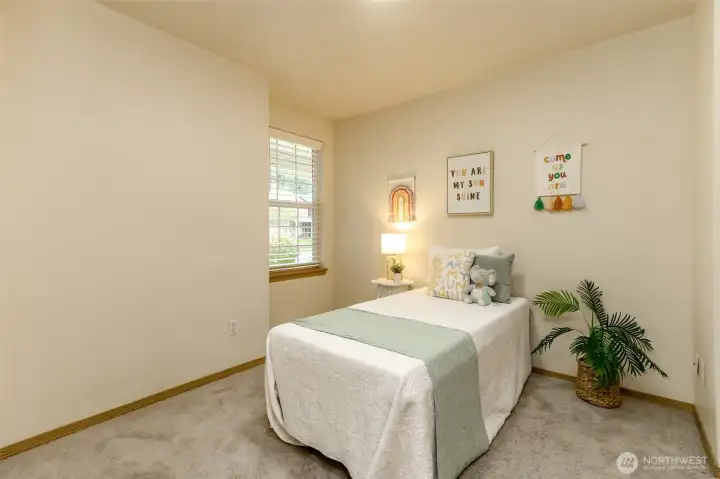 This extra bedroom overlooks the front yard.