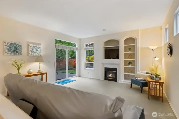 Built in shelving and gas fireplace