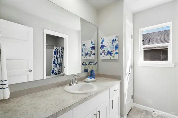 **THIS HOME IS A UNDER CONSTRUCTION. Photos are of a different home, same floorplan. Colors, features and specs will vary.