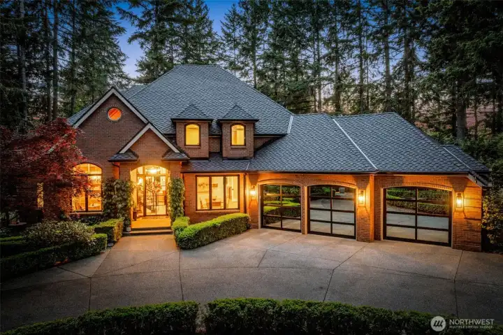 Front Exterior - Glass Entry, Mirrored Garage Doors