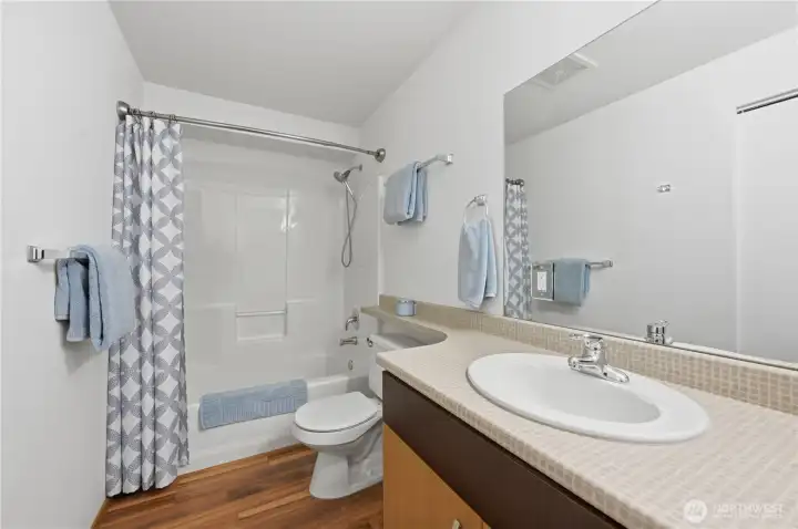 Large bath with tub/shower combo. Large bath with tub/shower combo.