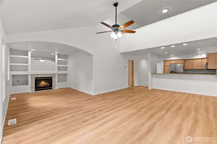 Wonderful angle to show this light-filled space, open to the loft above. Note the curved architecture and brand new trim package! Wonderful angle to show this light-filled space, open to the loft above. Note the curved architecture and brand new trim package!