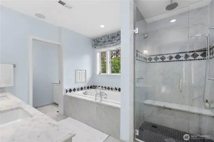 Beautiful marble primary bathroom. Beautiful marble primary bathroom.
