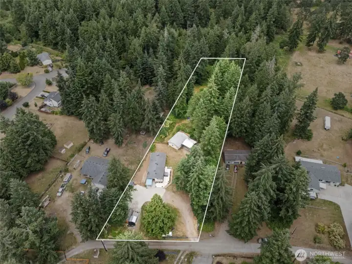 Aerial view. Property boundaries shown on map are approximate. Actual property lines may vary.