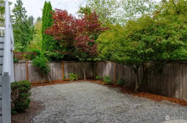 Fully fenced backyard will keep pets and little ones safe at play.