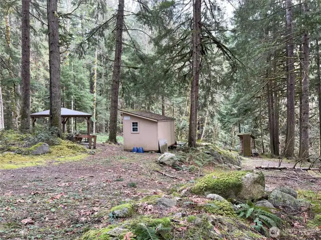 Covered area and locking storage shed