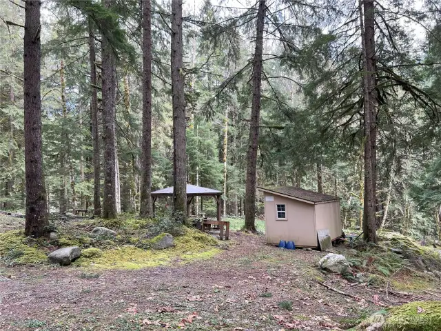 Covered area and locking storage shed