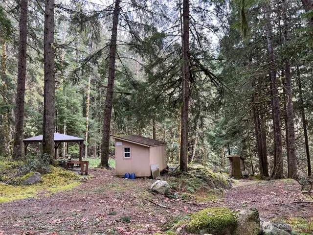 Covered area and locking storage shed