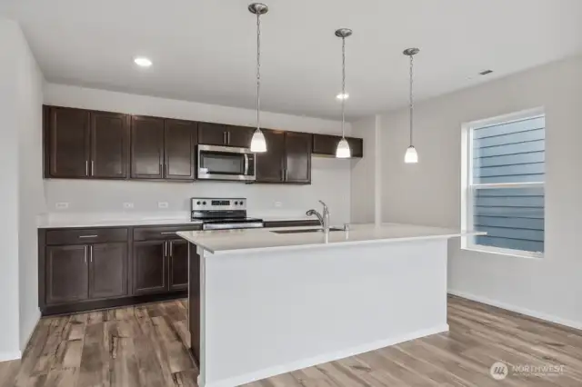 Photos are from the Lina model home in prior community. Finishes, upgrades, and features will vary.
