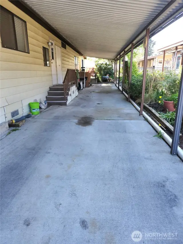 Long carport with room for multi cars/trucks/boat/trailer etc.