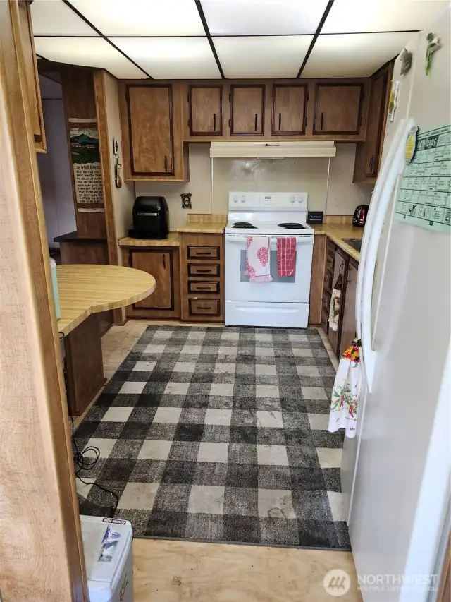 Good sized walk thru kitchen with seating