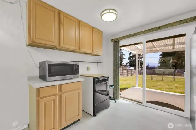 Slider door to covered patio ideal for the PNW