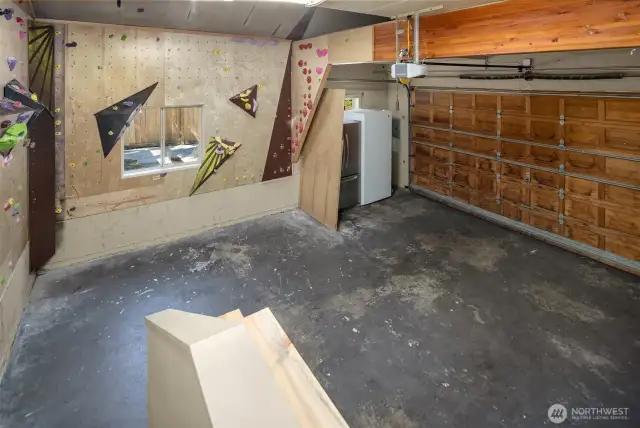 Two car garage with a fantastic climbing wall.