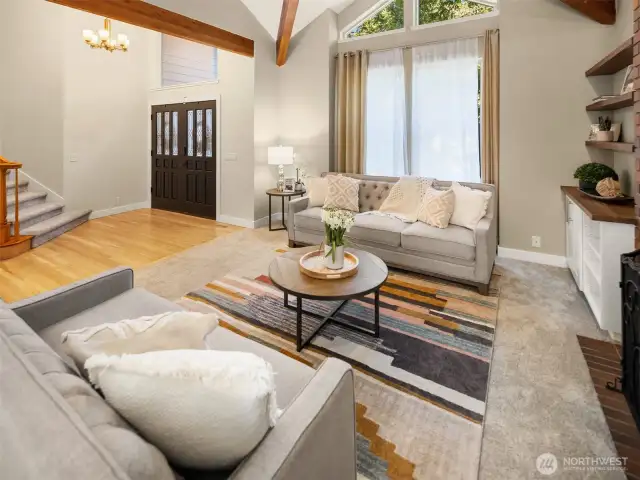 Wood beams accentuate the high ceilings in the living room!