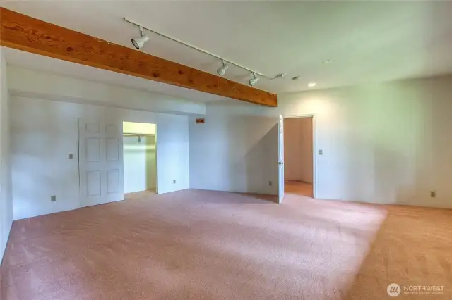 2nd bedroom with lit closet