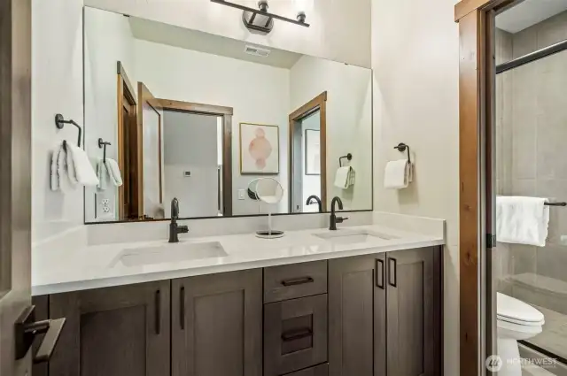 Upstairs hall bathroom serves the bunk room and the 2nd bedroom
