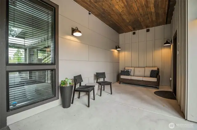 Another front porch seating area or perfect place to store skiing equipment after a long say on the slopes