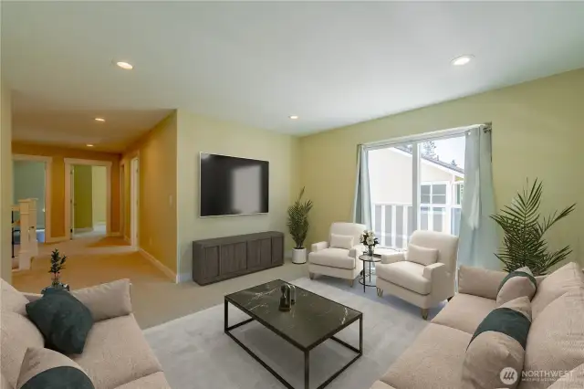 Den/rec room with access to balcony & upper deck.