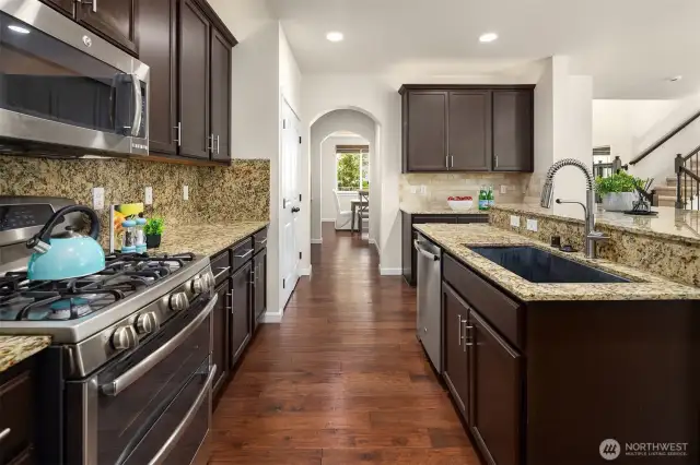 kitchen to butler's pantry, powder room, and formal dining room.
