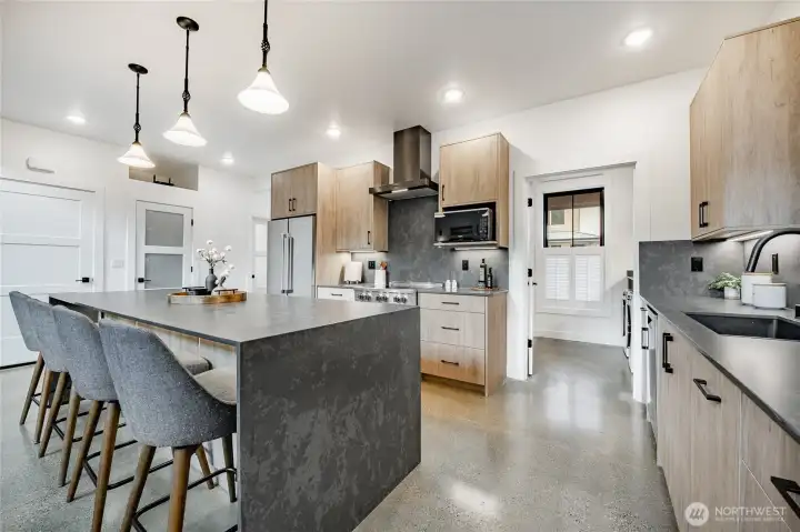 Beko induction range, including Beko dishwasher, refrigerator, hood vent and washer/dryer.