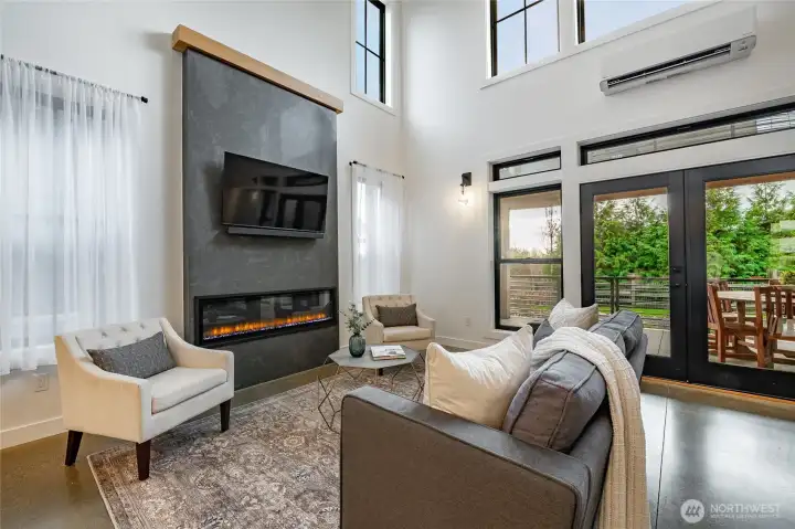 Electric fireplace is also plumed for natural gas if you desire a gas fireplace. The French door to the patio is an upgraded feature. Other homes have sliding doors.