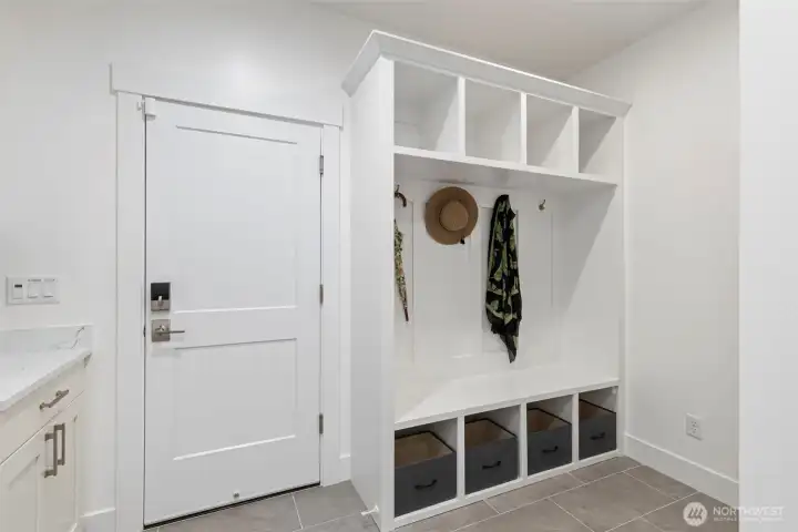 Laundry room heading out to 3 car garage.