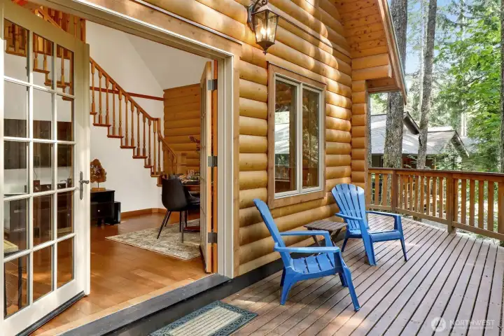 Wrap around deck and french doors to greet you. Windows and doors are of double glass high quality wood construction with Aluminum clad exterior profiles for maintenance free life and quality hardware including top and bottom locking pins for doors, operated by door handle.