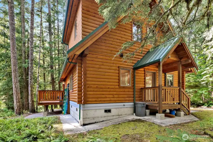 8" engineered log construction secured with steel rods and finished in a rich weather-resistant stain