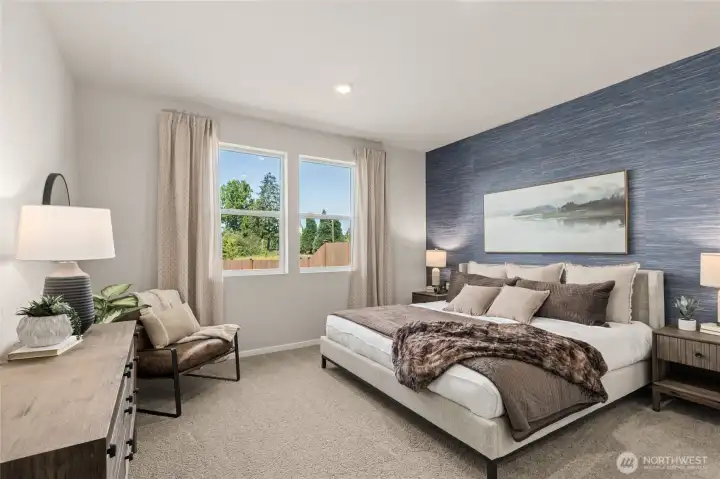 Large primary suite can accommodate a King size mattress and more! Actual home is under construction. Colors, materials, and features may vary. See site agent for details.