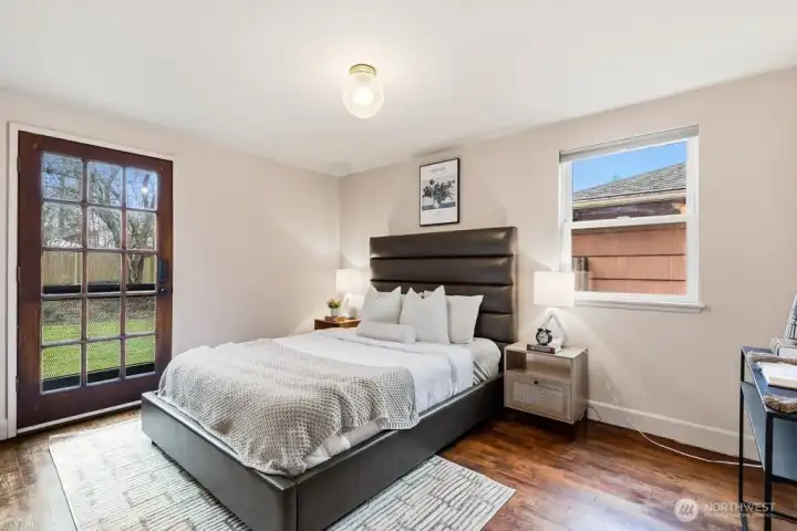 bedroom with access to backyard